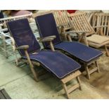 GARDEN STEAMER LONGE CHAIRS, a pair, 155cm x 60cm x 100cm, weathered teak, blue cushions. (2)