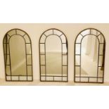 ARCHITECTURAL GARDEN MIRRORS, a set of three, arched bronzed metal frames, 107cm x 55cm. (3)