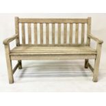 'WESTMINSTER' GARDEN BENCH, nicely weathered slatted teak by 'Westminster', 118cm W.