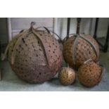HANGING SPHERES, four rust metal of different sizes, largest 61cm smallest 23cm.