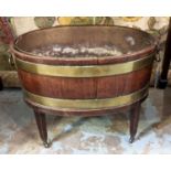 OVAL WINE COOLER, 65cm W x 44cm D x 45cm H, George III brass bound mahogany with brass liner on