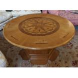 LOW YACHT TABLE, 53cm H x 109cm, fruitwood and marquetry with circular nautical compass inlaid top