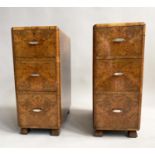 ART DECO BEDSIDE CHESTS, a pair burr walnut each with three drawers and silvered handles, 29cm W x