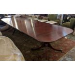 DINING TABLE, 348cm L extended x 73cm H x 114cm D mahogany extending with three extra leaves on twin