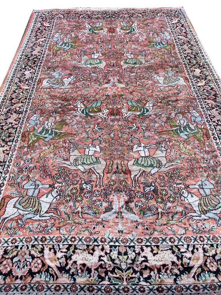 FINE SILK HUNTING DESIGN RUG, 232cm x 147cm.