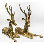 CONTEMPORARY SCHOOL SCULPTURAL RECUMBENT STAGS, a pair, 62cm H. (2)