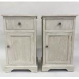 BEDSIDE CHESTS, a pair, grey painted each with drawer and door and reeded fronts, 40cm x 32cm x 71cm