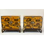 CHINESE SIDE CABINETS, a pair, sienna lacquered silvered mounted and polychrome Chinoiserie