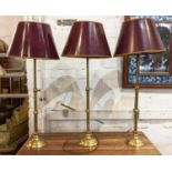 TABLE LAMPS, each approx 75cm H, including shades, three, adjustable, slender brass columns. (3)