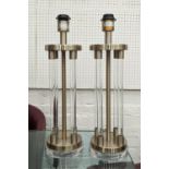 TABLE LAMPS, a pair, bases including stems each 53cm H, perspex columns with shades.