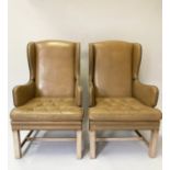 WING ARMCHAIRS, a pair George III design with studded sienna leather each with button upholstered