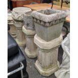 ARCHITECTURAL GARDEN PEDESTALS, a set of three, 100cm at tallest, each with differing planter,