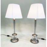 TABLE LAMPS, a pair fluted glass columns with incised barrel plinths and pleated shades, 74cm H. (2)