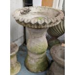 ARCHITECTURAL GARDEN PLANTERS ON STANDS, a pair, composite stone, 79cm x 53cm diam. (2)