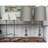 TABLE LAMPS, two pairs, one pair with graduated glass globular sections, coloured shades, 65cm H,