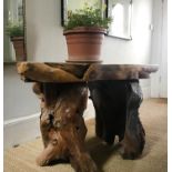 RUSTIC GARDEN TABLE, live edge yewwood with tree root support, 135cm x 69cm x 73cm H.
