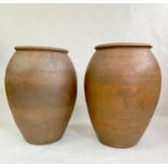 OLIVE JARS, a pair, antique terracotta of typical form, 90cm H x 60cm. (2)