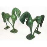 HORSE SCULPTURES, a pair, verdigris bronze, 110cm x 100cm. (2)