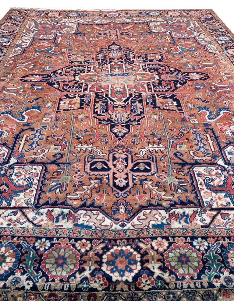 ANTIQUE PERSIAN HERIZ CARPET, 339cm x 280cm.