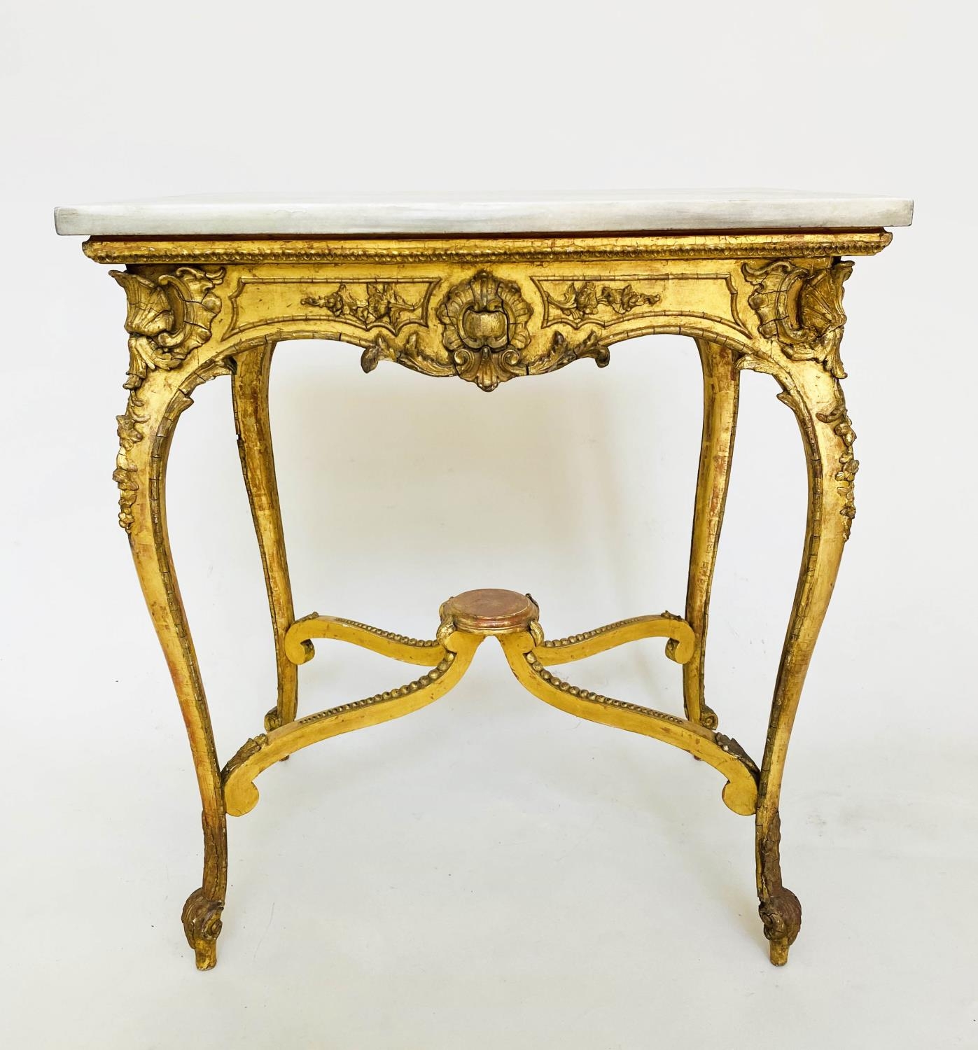 CENTRE TABLE, 19th century Italian giltwood and gesso with shell and C scroll decoration, marble top