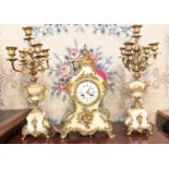 CLOCK, 47cm H x 38cm W, French style, alabaster with gilt mounts, and a pair of candelabra to match,