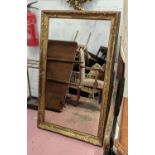 WALL MIRROR, 69cm x 114cm H, 19th century French giltwood with later antiqued plate.
