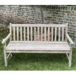 GARDEN BENCH, weathered teak of slatted construction by 'Regatta', 149cm W.