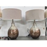 GLASS DEMIJOHN SILVERED TABLE LAMPS, a pair, each 71cm tall overall including shades. (2)