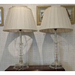LAMPS, a pair, clear moulded glass columns with silk pleated shades, 70cm H. (2)