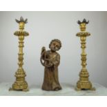 ECCLESIASTICAL CANDLESTICKS, a pair, 65cm H, and a carved wooden altar figure, 45cm H. (3)