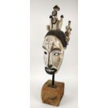 IBO MAIDEN MASK, Nigeria, Africa, 78cm H on stand.