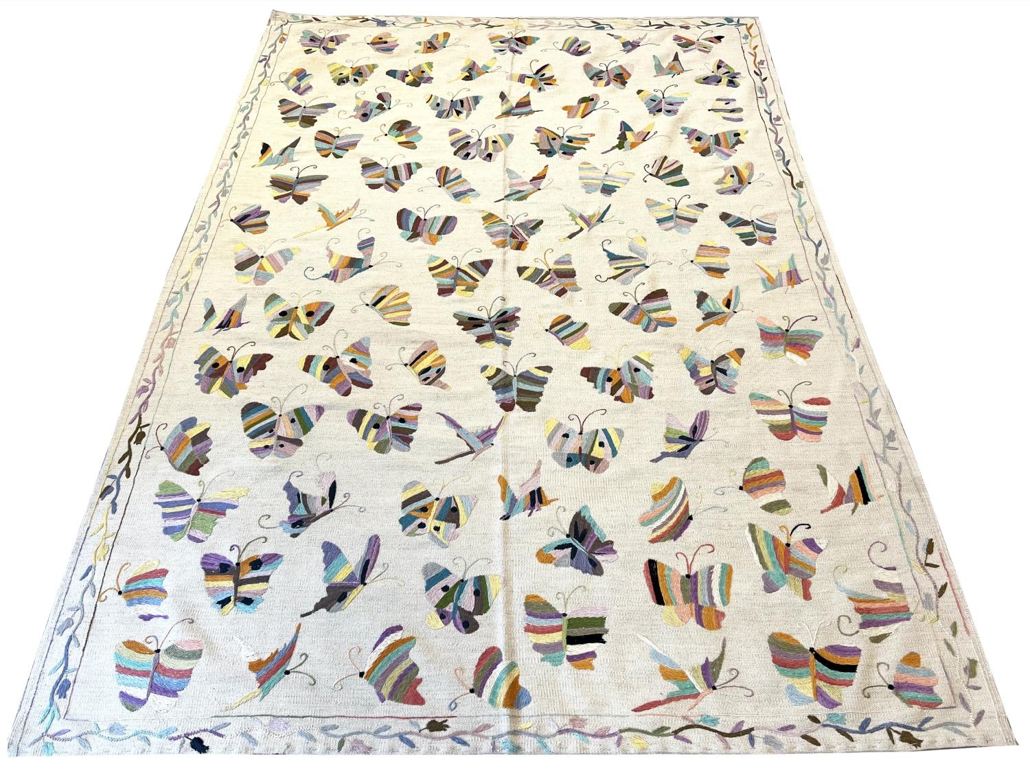 FINE SUZANI BUTTERFLY KILIM, 287cm x 204cm.