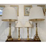 LAMPS, a pair, brass fluted columns with pleated silk shades, plus a pair of brass candlestick