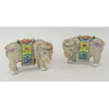 CHINESE EXPORT ELEPHANT CANDLESTICKS, a pair, famille rose canton enamel decoration, 18cm. (2)