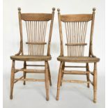 SIDE CHAIRS, a pair, early 20th century American oak with spindle backs. (2)