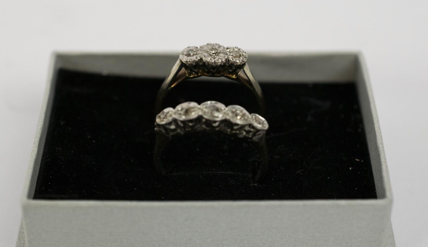 TWO RINGS, comprising a 9ct gold three stone diamond illusion set ring, size N, plus a platinum five - Image 6 of 7