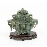 SPINACH JADE CHINESE KORO AND COVER, 20th century, the dragon head handles with loose rings, on