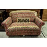 KILIM SOFA, on short turned feet, 148cm L x 83cm H.