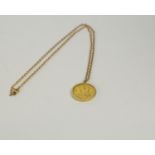 PENDANT NECKLACE, Elizabeth II 22ct gold 1966 Sovereign, fitted in a 9ct gold mount with chain,