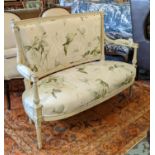 CANAPE, French Louis XVI design white painted with leaf and floral patterned upholstery on fluted