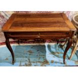 WRITING TABLE, Louis XV walnut, circa 1750, with a single drawer above a shell decorated frieze on