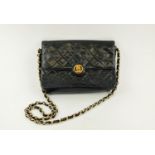 VINTAGE CHANEL FLAP BAG, round turn-lock, iconic burgundy leather lining, quilted front and back