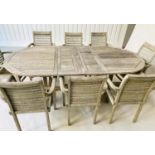 EXTENDING GARDEN TABLE AND CHAIRS, a set, silvery weathered teak with eight armchairs and