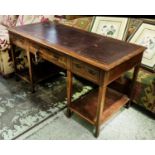 JOHNSTONE NORMAN & CO WRITING TABLE, circa 1905, mahogany and line inlaid with burgundy leather