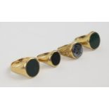 SIGNET RINGS, 9ct gold, group of four, comprising a pair with black agate stones, one with a black
