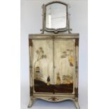 DRESSING CABINET, early 20th century, cream lacquered and gilt Chinoiserie decorated, with swing