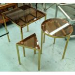 MARTINI TABLES, a set of three, 45cm x 45cm x 56cm at largest, various shapes, amber glass tops. (3)