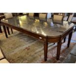 DINING TABLE, 134cm W x 79cm H x 270cm L, mahogany in the Continental manner, with walnut, gilt