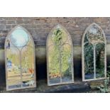 ARCHITECTURAL GARDEN MIRRORS, a set of three, Gothic style aged metal frames, 122cm x 56cm. (3)