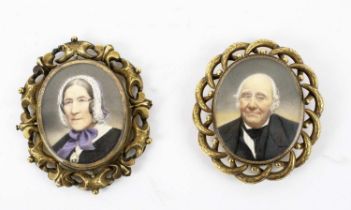 MOURNING BROOCHES, one depiciting the husband, who died in 1856, the other depiciting the wife